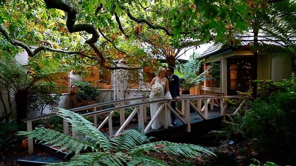 Couple on garden bridge Melbourne Wedding Videography and Photography