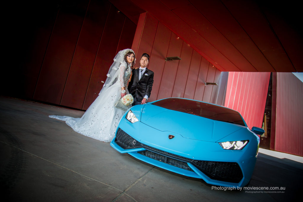 Melbourne Bride and groom with a blue Lamborgini Wedding Videography and Photography